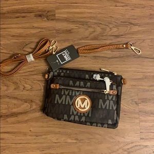 NWT MKF collections hand clutch or crossbody